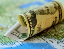 Canadian Dollar Slips As Investors Await Tariff Deal With Us